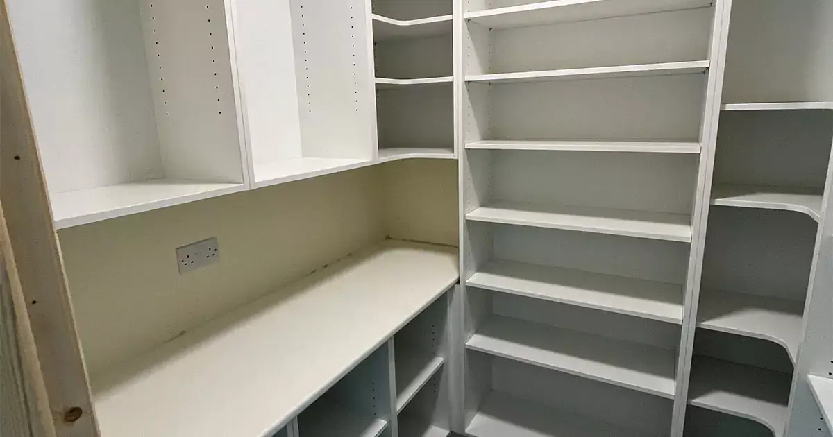 Custom pantry shelving Ireland showing flexible shelf heights for food storage
